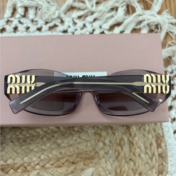 Miu Miu MU14ZS Violet Sunglasses